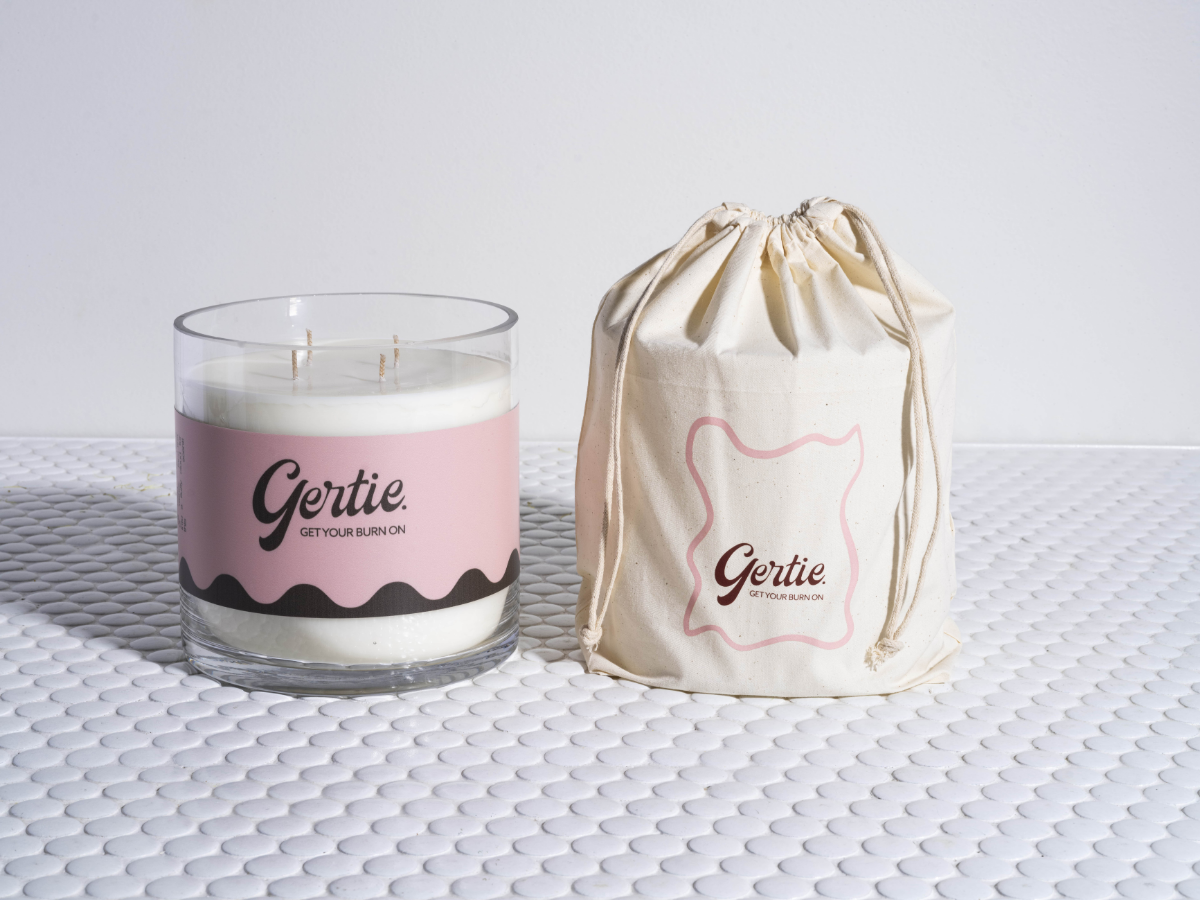 Gertie Palma Rosa 2kg Candle and drawstring bag on a textured surface
